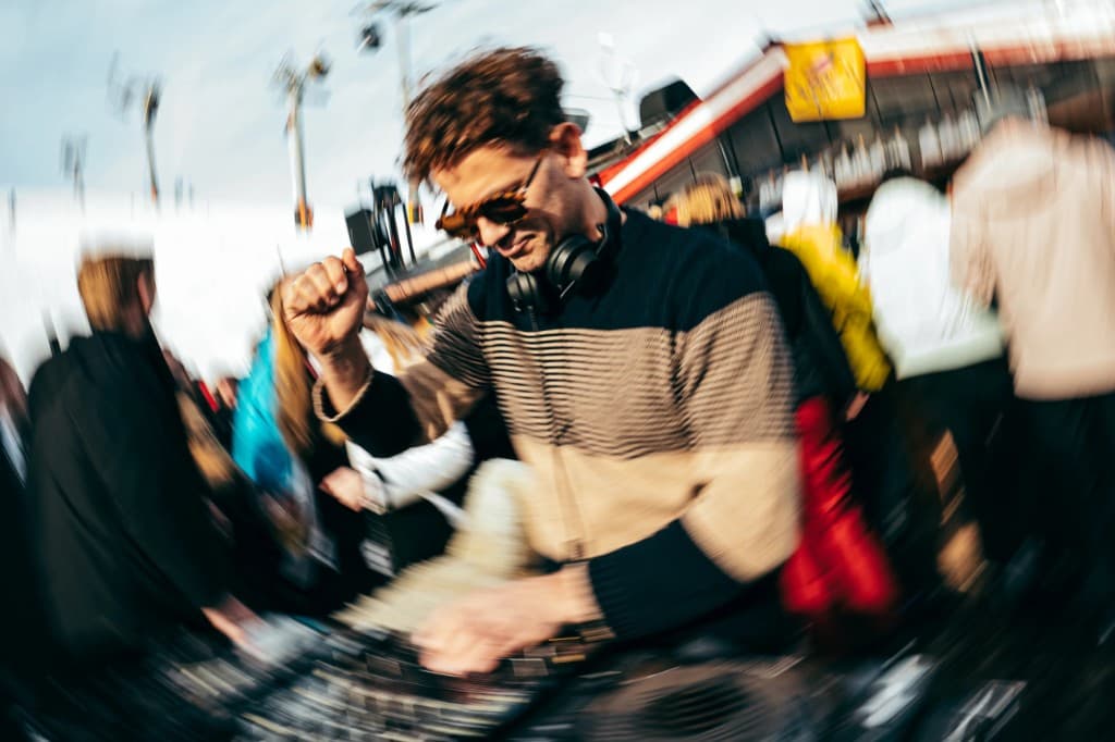 Marc Werner performing a DJ set at an outdoor event